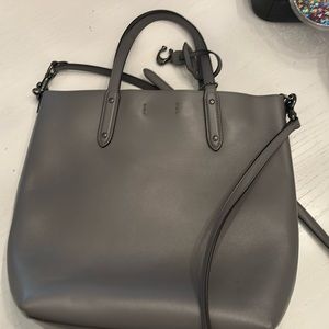 Gray leather Coach tote bag.